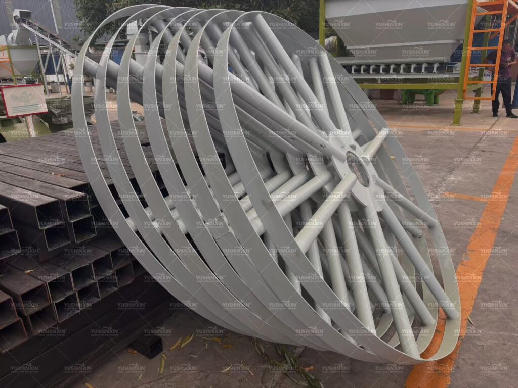 Fertilizer granulation equipment being loaded at the Yushuxin factory for shipment to Zambia