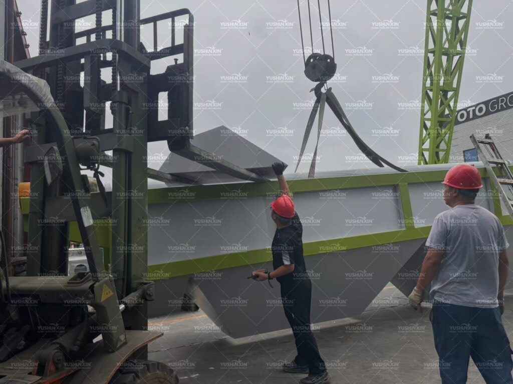 Fertilizer granulation equipment being loaded at the Yushuxin factory for shipment to Zambia